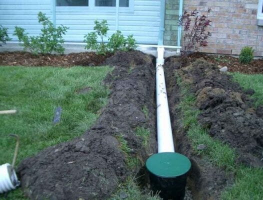 how-to-fix-water-drainage-problems-in-yard