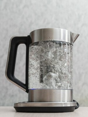glass teapot with boiling water