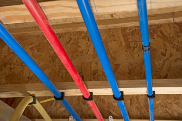 PEX pipes on basement ceiling