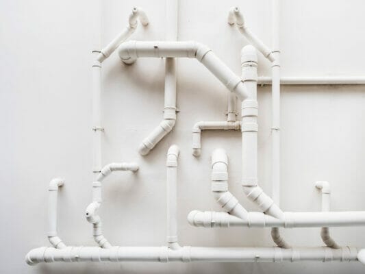 Pipeline Plumbing system on white wall