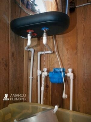 leaking water heater - canva
