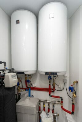 Vertical photo of central hydraulic boiler system with white hea